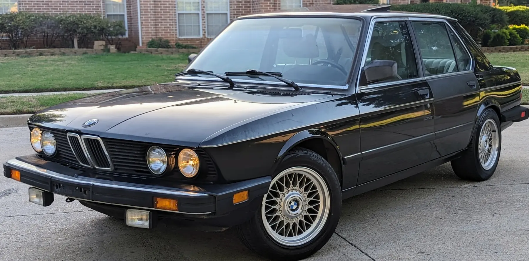 Black classic BMW 5 Series sedan