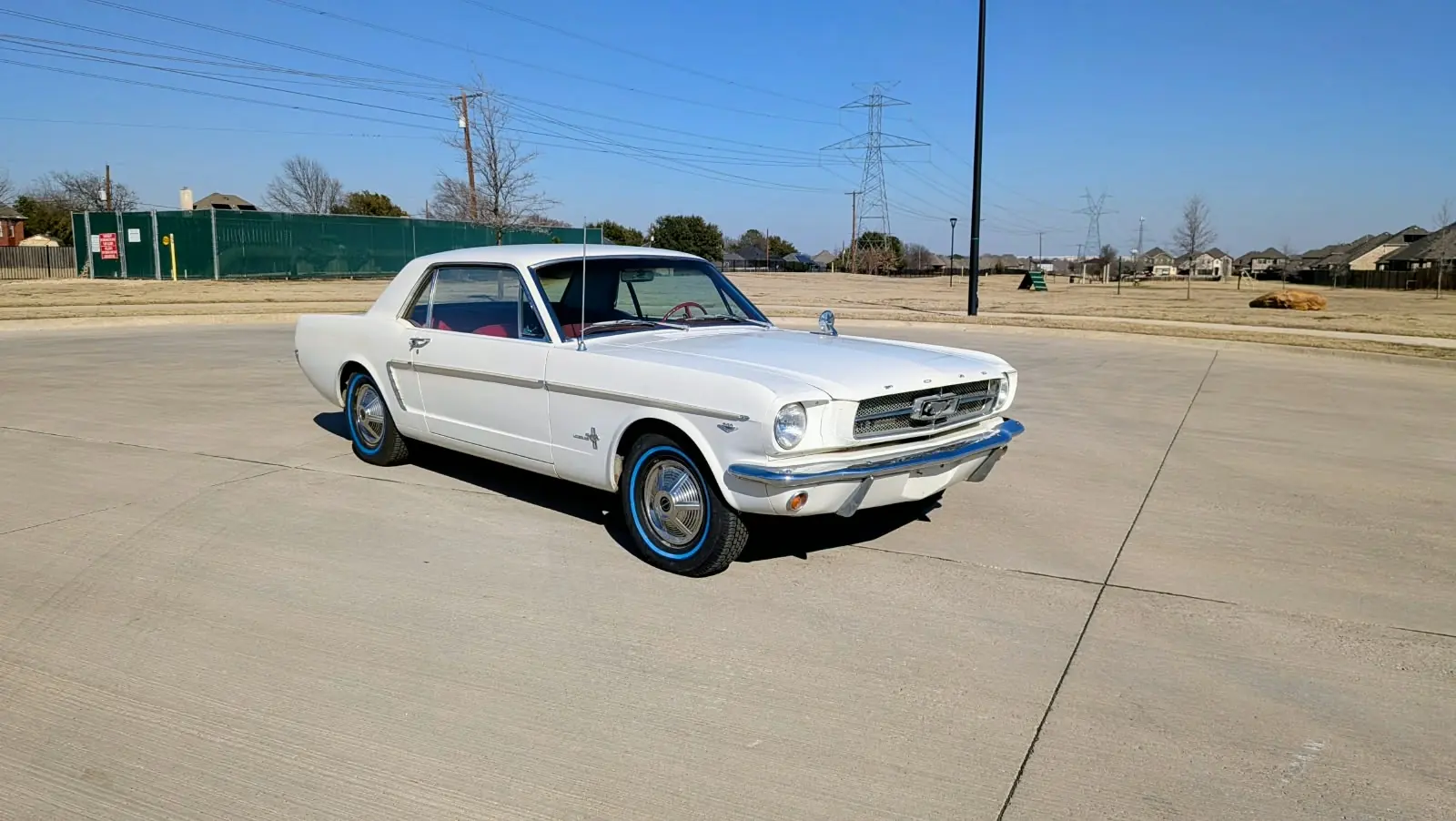 White classic Ford Mustang photographed for D-Drive Auto